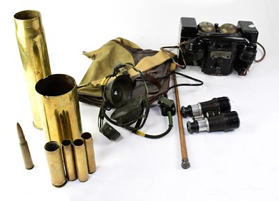 Lot 549 - A WWII black field telephone M.II, a headset,...
