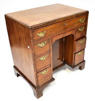 Lot 120 - A George III mahogany crossbanded kneehole...