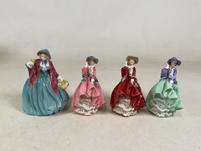 Lot 169 - ROYAL DOULTON; four figures comprising Lady...