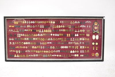 Lot 480 - A collection of 157 pairs of regimental pips...