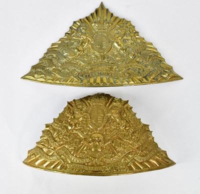 Lot 469 - Two pressed brass helmet plates for the...