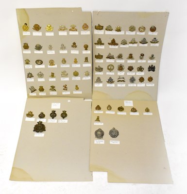 Lot 539 - Over seventy British military cap and uniform...