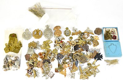 Lot 473 - A quantity of various military badges and...