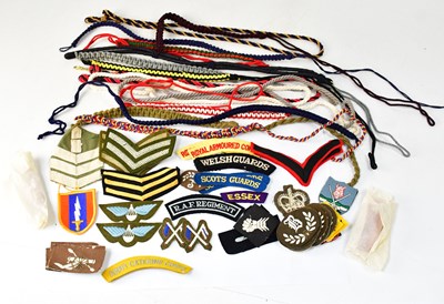 Lot 464 - A quantity of various military cloth badges,...