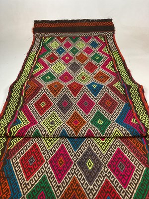 Lot 652 - A Suzmi Kilim runner, 315 x 72cm.