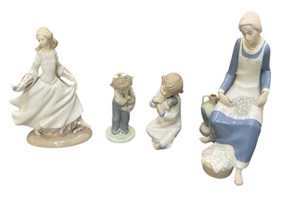 Lot 600 - LLADRÓ; a figure of Cinderella, height 25cm,...