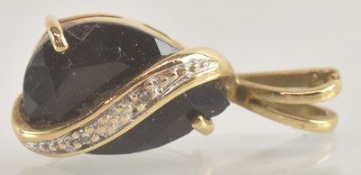 Lot 1439 - A 9ct gold necklace pendant, with claw set...