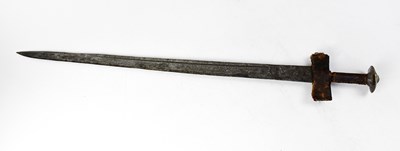 Lot 583 - A 19th century African broad sword with...