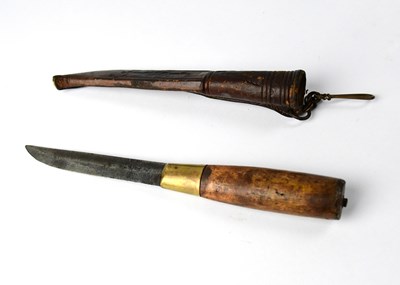 Lot 567 - A Scandinavian puukko knife with simple turned...