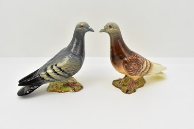 Lot 104 - BESWICK; two high gloss figures of pigeons,...