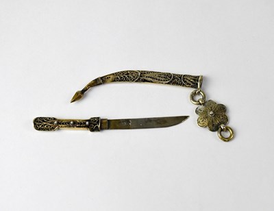 Lot 856 - A miniature Russian Kindjal with filigree...