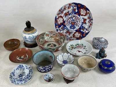 Lot 271 - A group of predominantly Asian ceramics...