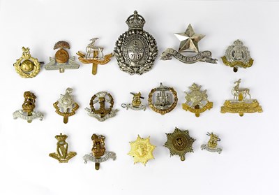 Lot 531 - A quantity of cap badges to include The King's...