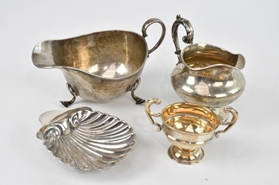 Lot 2316 - A George V hallmarked silver sauce boat,...