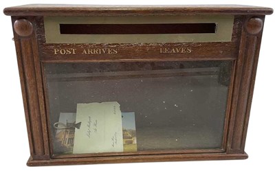 Lot 10 - An Edwardian brass mounted oak country house...