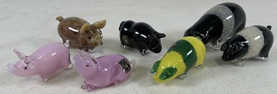Lot 282 - LANGHAM; seven glass pigs, to include...