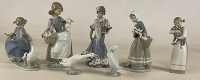 Lot 168 - LLADRO; a collection of five figures...