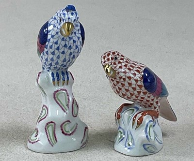Lot 164 - HEREND; two small porcelain figures of parrots...