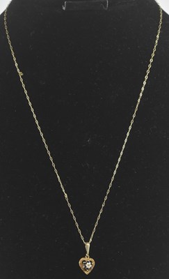 Lot 1736 - A 9ct gold dainty necklace, with a heart...