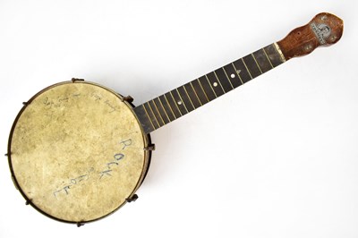 Lot 293 - GEORGE FORMBY; a four-string banjolele, signed...