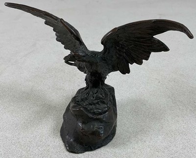 Lot 135 - AFTER THE ANTIQUE; a bronze pocket watch stand...