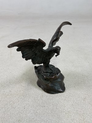 Lot 135 - AFTER THE ANTIQUE; a bronze pocket watch stand...