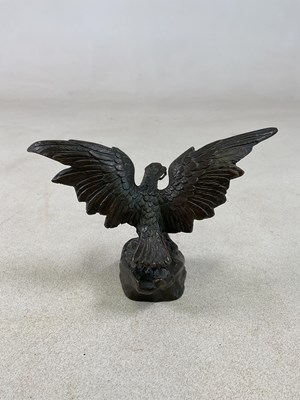 Lot 135 - AFTER THE ANTIQUE; a bronze pocket watch stand...