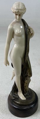 Lot 138 - AFTER FERDINAND PREISS; a faux ivory and gilt...