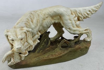 Lot 225 - ROYAL DUX; a figure of a retriever with...