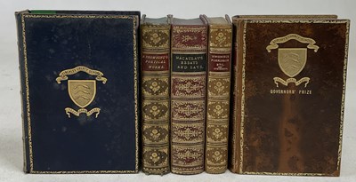 Lot 343 - A collection of five leather bound prize...
