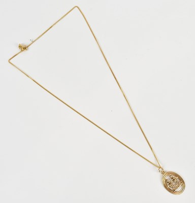 Lot 267 - A 9ct yellow gold oval pendant, inscribed...