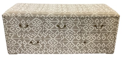 Lot 21 - A modern beige upholstered chest of three...