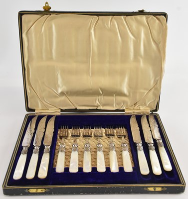 Lot 1076 - An early 20th century cased set of six silver...