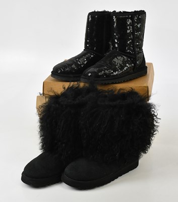 Lot 682 - UGG; a pair of sheepskin cuff suede black...