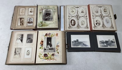 Lot 298 - Three Victorian photograph albums, two full,...