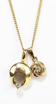 Lot 1396 - A 9ct yellow gold fine link chain suspending...