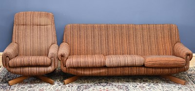 Lot 1412 - A 1970's teak three seater settee and easy...