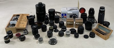 Lot 25 - A small quantity of lenses, various makers to...