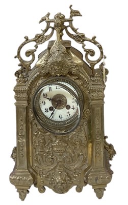 Lot 121 - An early 20th century brass cased mantel clock,...