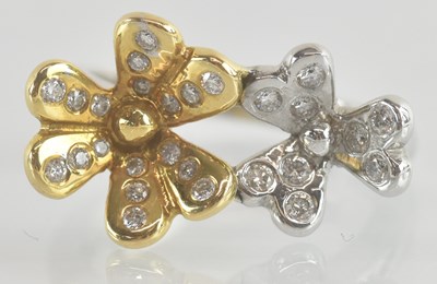 Lot 1232 - An 18ct yellow and white gold diamond set...
