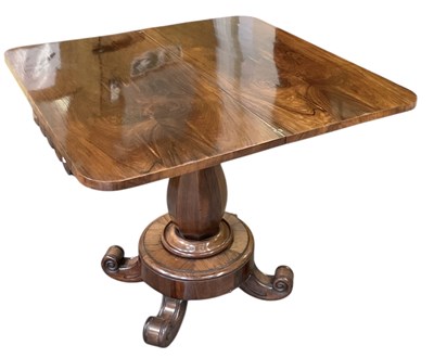 Lot 81 - A 19th century rosewood foldover tea table,...