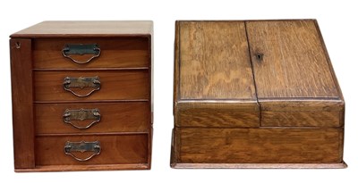Lot 41 - An early 20th century oak tabletop stationery...