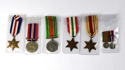 Lot 518 - A WWII medal group, Africa Star, France and...