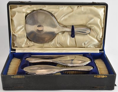 Lot 1131 - HASSETT & HARPER LTD; a cased George V...