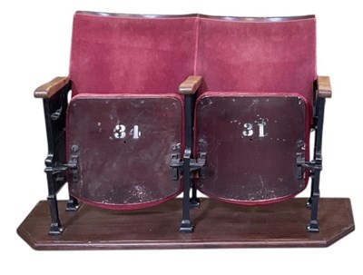 Lot 29 - A 1950s folding cast iron red velvet...