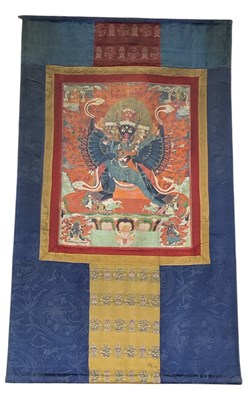 Lot 1001 - An 18th/19th century Tibetan thangka, with...
