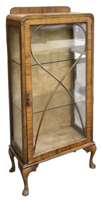 Lot 47 - A 1930s Art Deco walnut veneered display...