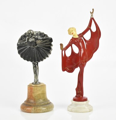 Lot 174 - An Art Deco red painted spelter and ivory...