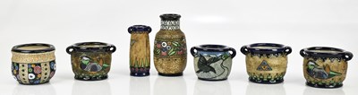 Lot 109 - AMPHORA; seven vases/miniature jardinières,...