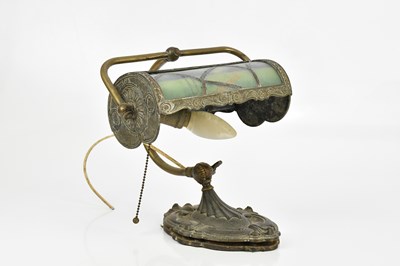 Lot 48 - An American Arts & Crafts desk lamp, with two...